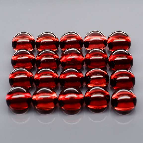 Incredible 8.96ct open color Mozambique Garnet cabochon set