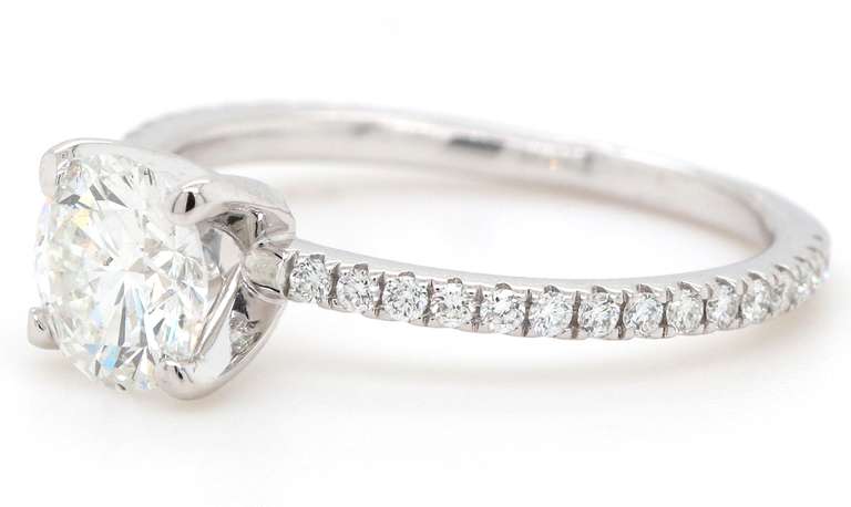 Eyecatching 18kt White Gold approximate 1.25ctw Round Diamond Straight Engagement Ring