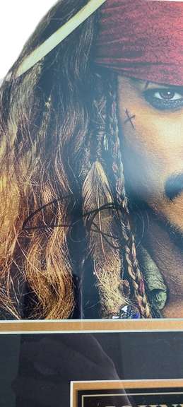 Johnny Depp Autographed Framed Metalic Pirates of The Caribbean Photo ACOA