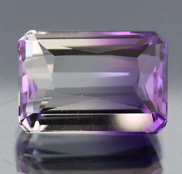 Beautiful 19.50ct top color created Ametrine