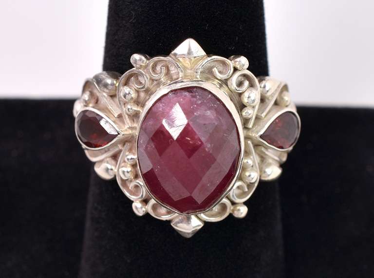 Enhanced Ruby Flanked By Garnets Set In Sterling Ring