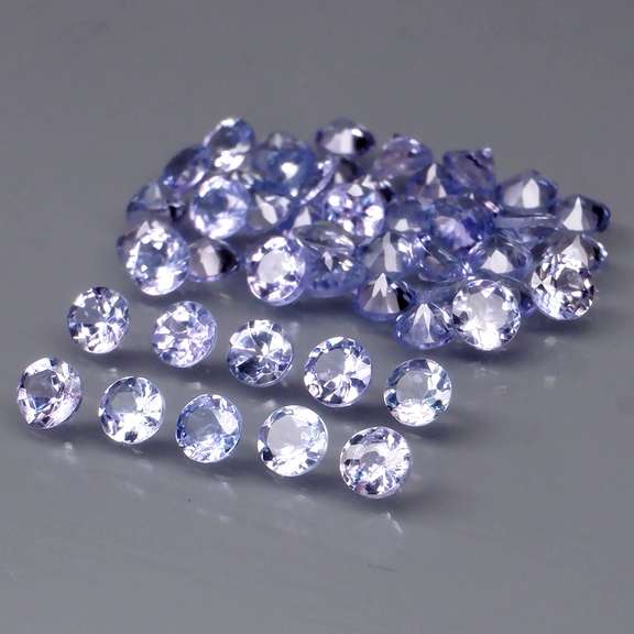 Heavy flashing 3.23ct diamond cut Tanzanite set
