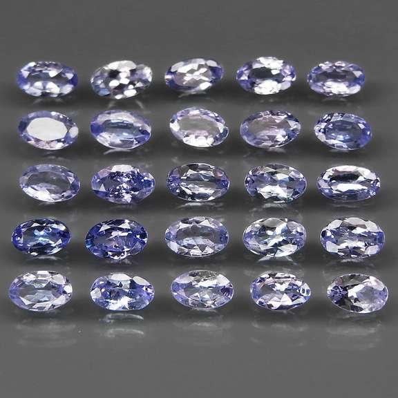 Glittering 5.28ct bright blue violet Tanzanite set