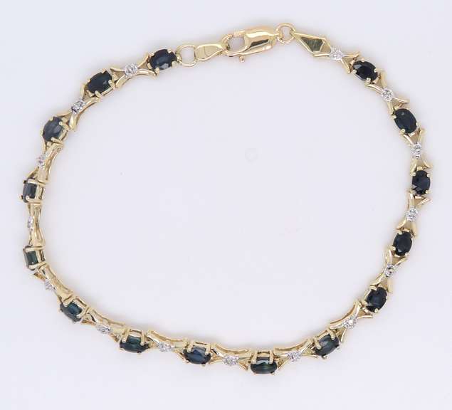 Fantastic Yellow Gold Oval Blue Sapphire and Diamond X Bracelet