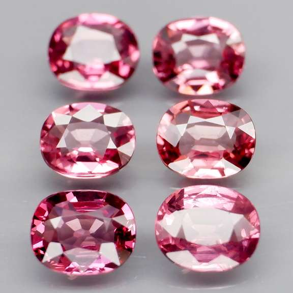 Amazing 4.46ct oval cut violet red Garnet set