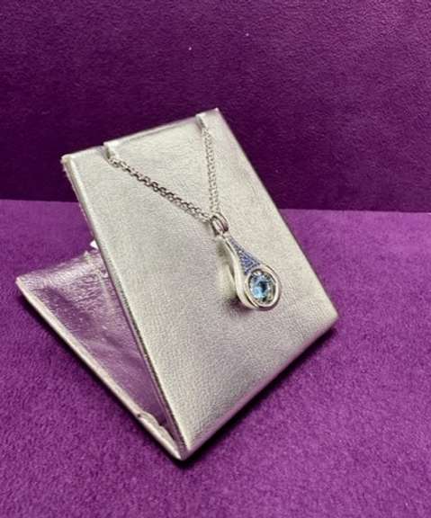 Sterling silver with large fancy blue pendant