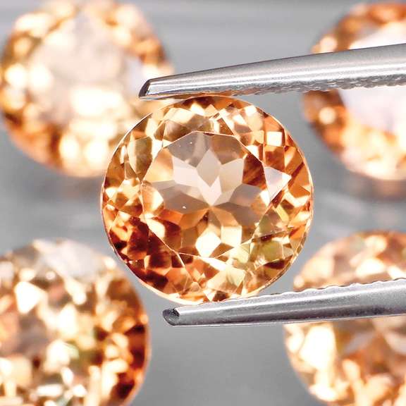 Gorgeous 11.67ct Imperial Topaz set of solitaires