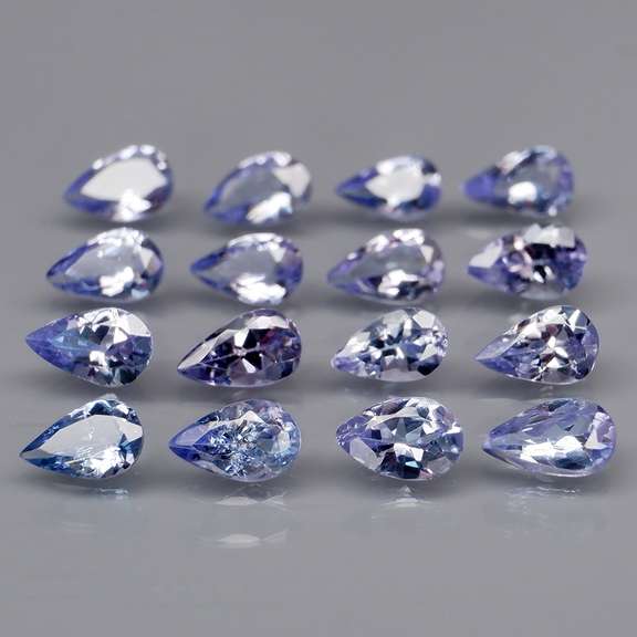 Heavy flashing 3.24ct pear cut Tanzanite set