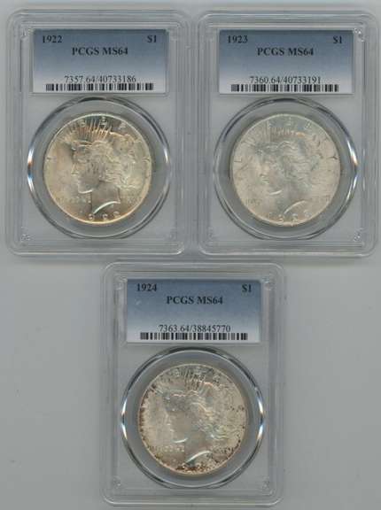 3 Diff. near Gem BU 1922-1924 Peace Silver Dollars. NGC MS64