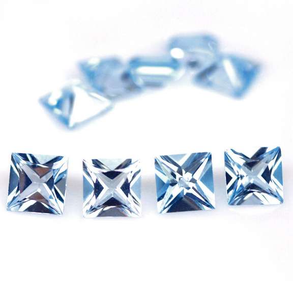 Amazing 10.61ct radiant cut ice blue Topaz set
