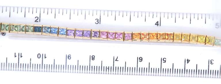 Attractive Yellow Gold approximate 10.20ctw Multi Color Sapphire Channel Set Bracelet