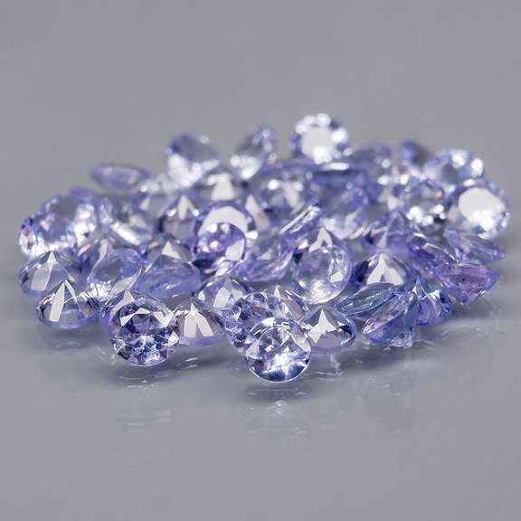 Heavy flashing 3.33ct diamond cut Tanzanite set