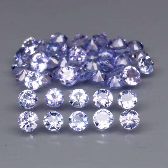 Heavy flashing 3.24ct diamond cut Tanzanite set