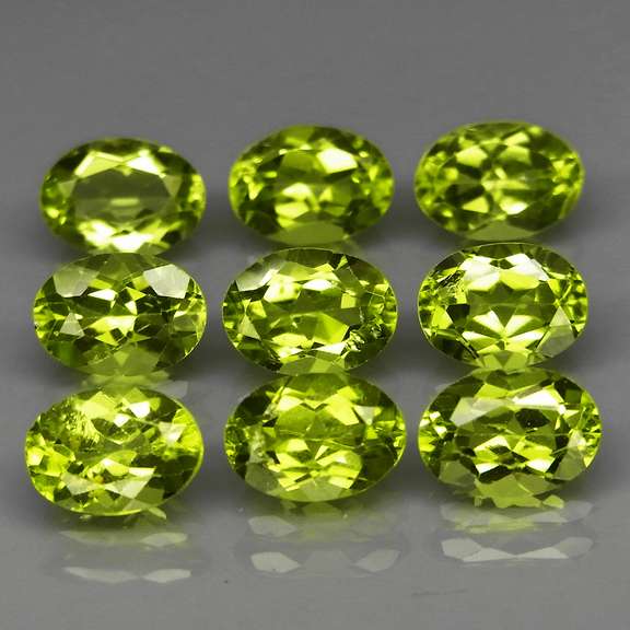 Dazzling 7.53ct untreated apple green Peridot set