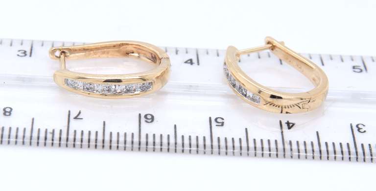 Elegant Yellow Gold Round Brilliant Cut and Baguette Diamond Earrings