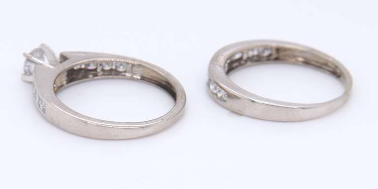 Dazzling White Gold Round Brilliant Cut Diamond Channel Set Bridal Set