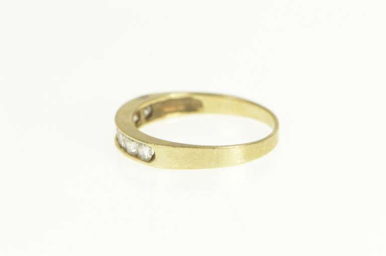 10K Yellow Gold Classic Channel Wedding Band Cubic Zirconia Ring