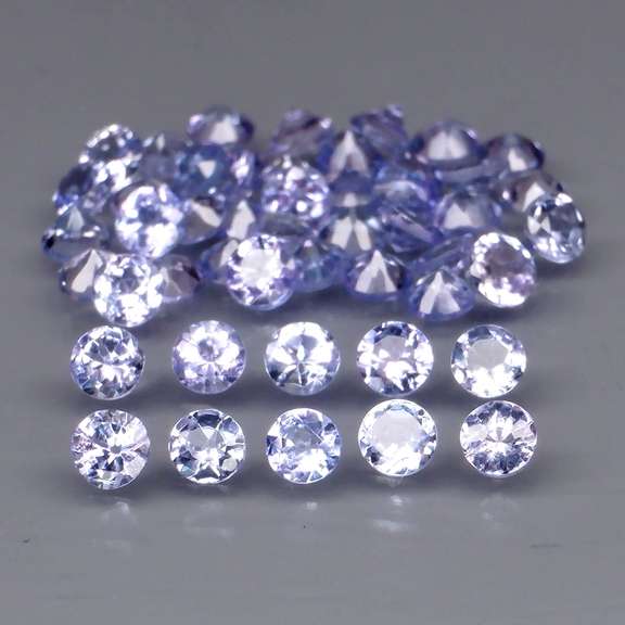 Heavy flashing 3.23ct diamond cut Tanzanite set