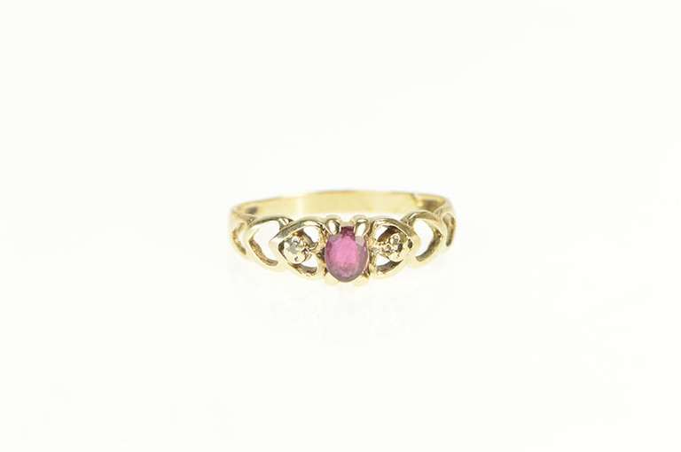 10K Yellow Gold Oval Natural Ruby Diamond Accent Heart Ring