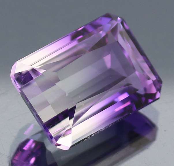 Beautiful 19.50ct top color created Ametrine