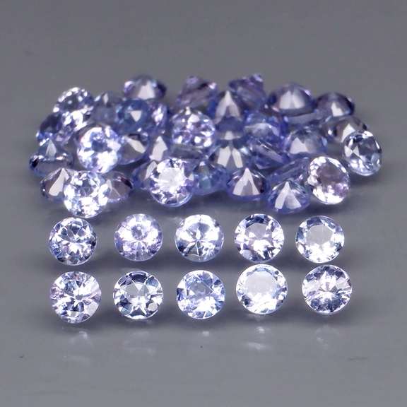 Heavy flashing 3.26ct diamond cut Tanzanite set