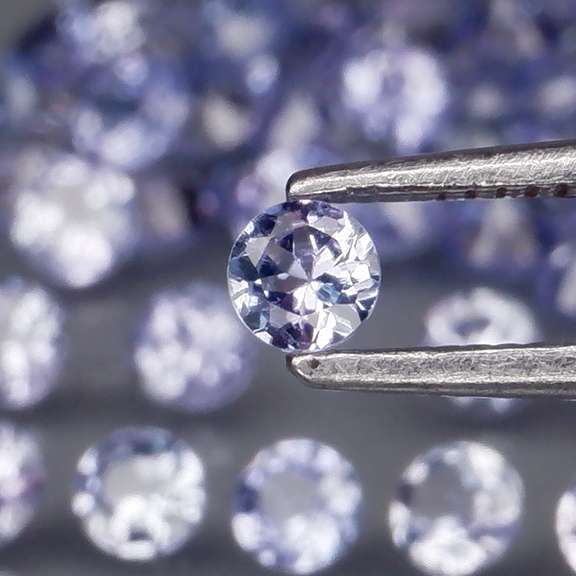 Heavy flashing 3.56ct diamond cut Tanzanite set