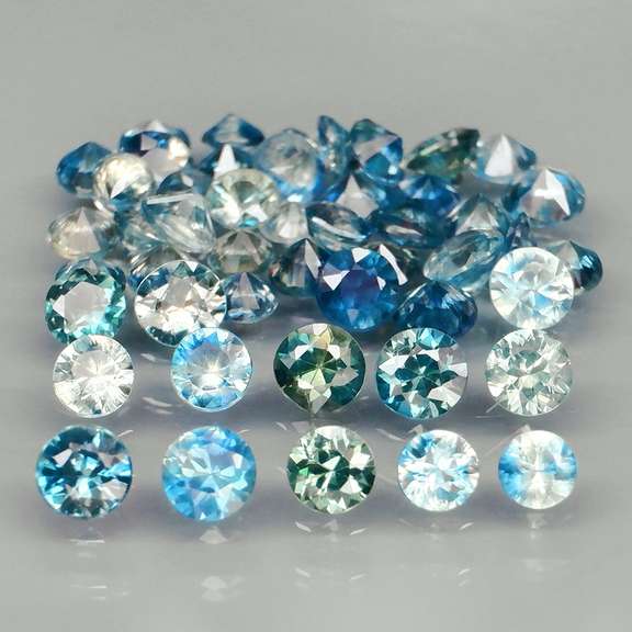 Heated only! 4.25ct blue green Sapphire set