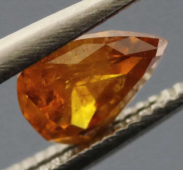 Stunning .43ct pear cut amber Diamond