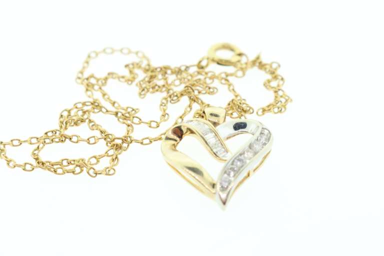Flattering Heart Shaped Diamond Necklace in 10KT Gold