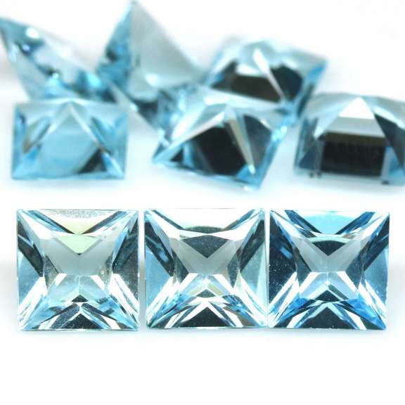 Bright! 10.36ct radiant cut sky blue Topaz set