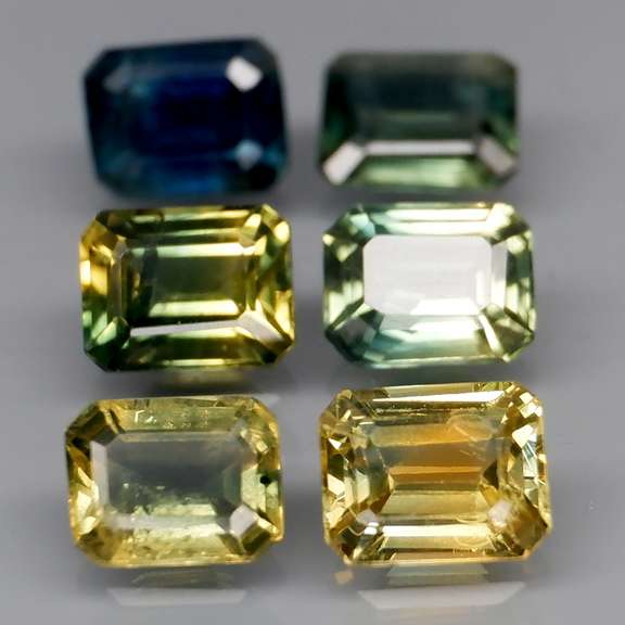 Heated only! 3.40ct emerald cut Sapphire set