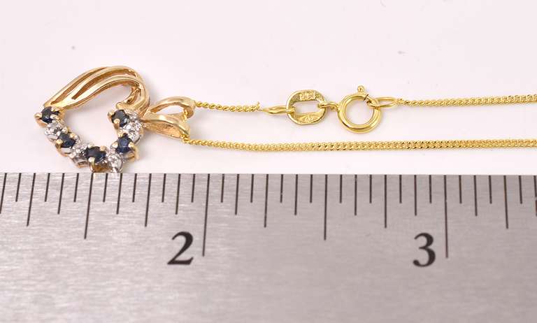 Brilliant Blue Sapphire and Diamond Heart Pendant Necklace in Yellow Gold