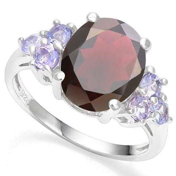 4.28CT GARNET & 2/3CT TANZANITE 18KT GOLD PLATED RING
