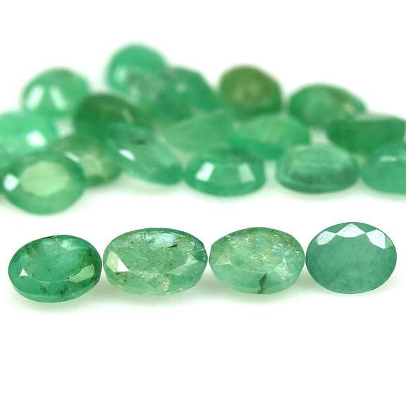 Oval cut 7.56ct Zambian Emerald set