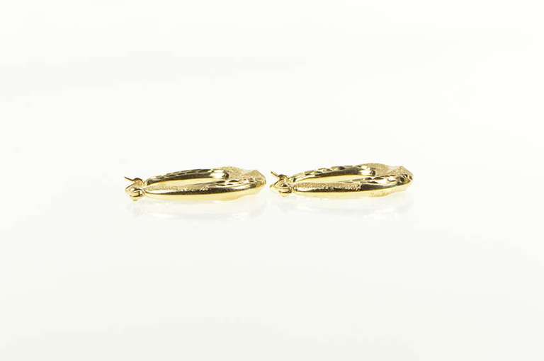 14K Yellow Gold Diamond Cut Retro Puffy Twist Oval Hoop Earrings