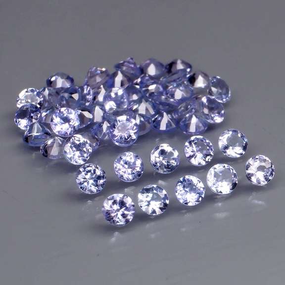 Heavy flashing 3.24ct diamond cut Tanzanite set