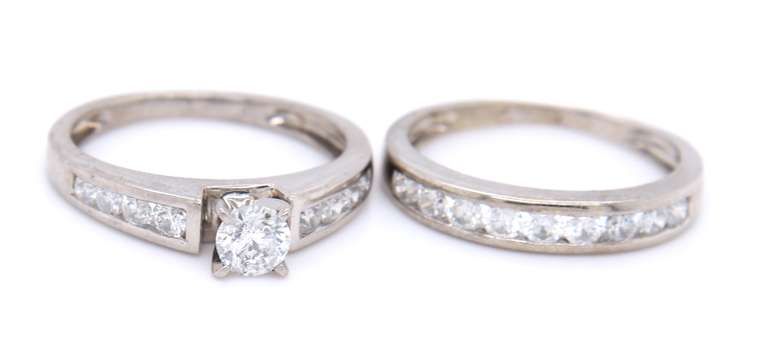 Dazzling White Gold Round Brilliant Cut Diamond Channel Set Bridal Set