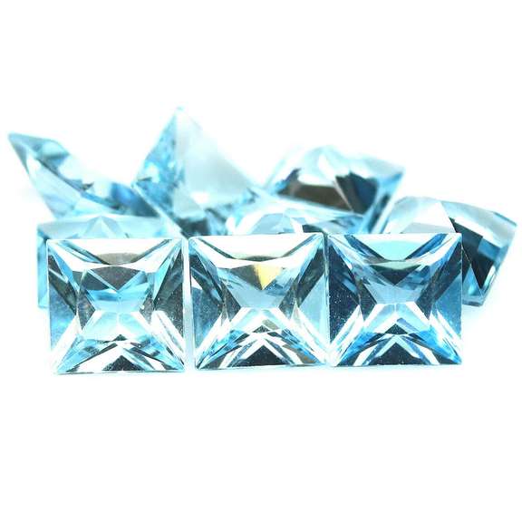 Bright! 10.36ct radiant cut sky blue Topaz set