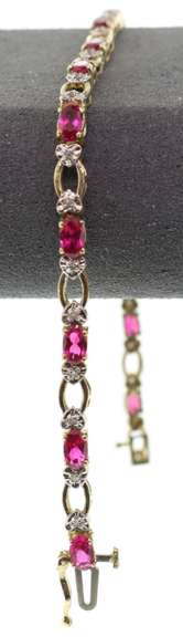 LADIES RUBIES AND DIAMOND GOLD BRACELET.