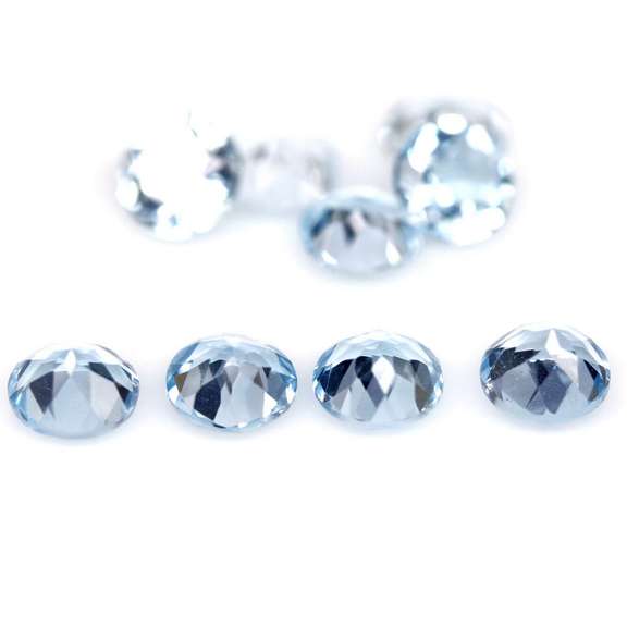 9 piece 13.89ct glittering sky blue Topaz set