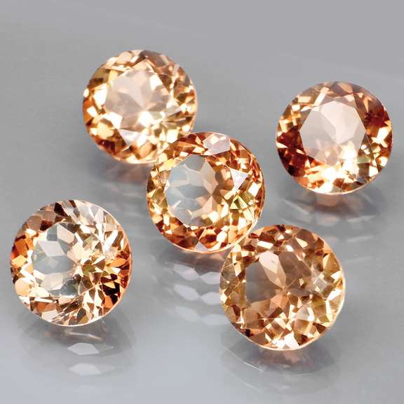 Gorgeous 11.67ct Imperial Topaz set of solitaires