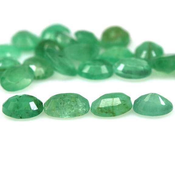 Oval cut 7.56ct Zambian Emerald set