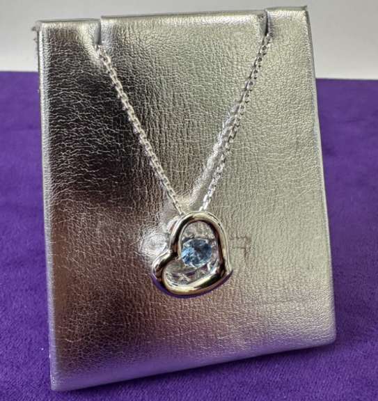 Platinum over 925 sterling silver with Fancy Blue center stone dancing Pendant