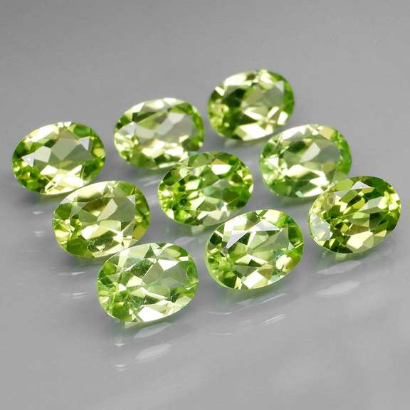 Dazzling 7.37ct untreated apple green Peridot set