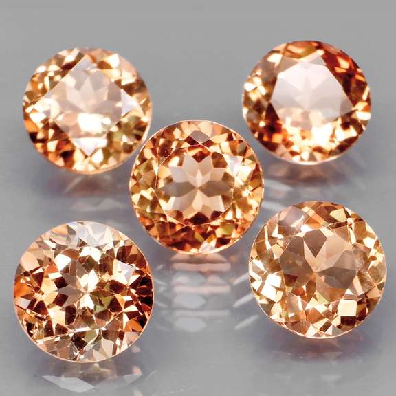Gorgeous 11.67ct Imperial Topaz set of solitaires