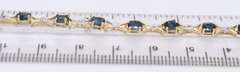 Fantastic Yellow Gold Oval Blue Sapphire and Diamond X Bracelet
