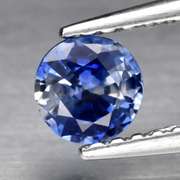 Heated only! 0.46ct bi-color calico Ceylon Sapphire solitaire