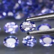 Glittering 5.30ct bright blue violet Tanzanite set