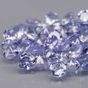 Heavy flashing 3.33ct diamond cut Tanzanite set