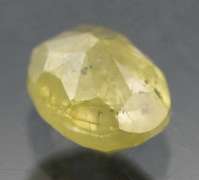 Eye catching .57ct oval cut yellow Diamond